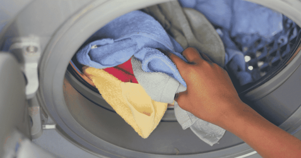 washing-machine-loading-laundry
